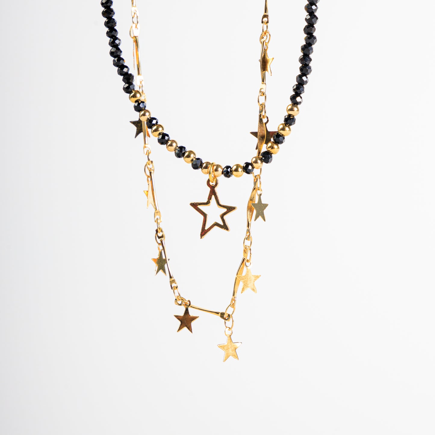 Layer doble con dijes estrellas